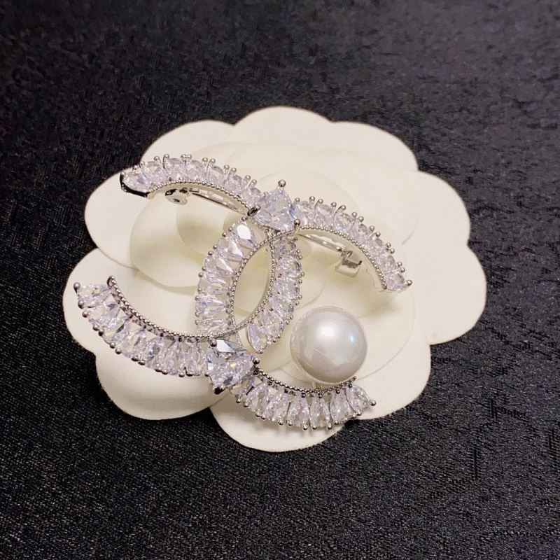 Ch**el brooches
